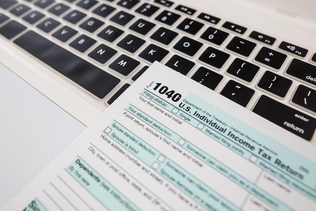 A close-up shot of a government document outlining the proposed changes in telehealth reimbursement policies for 2025. The focus is on the text related to cost control and quality assurance.