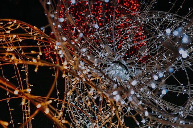A close-up shot of a sophisticated neural network diagram displayed on a computer screen, with lines connecting nodes and data points. The background is blurred, highlighting the complexity and interconnectedness of AI algorithms.