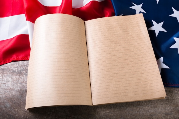 A close-up shot of a patent document with the US flag subtly in the background, emphasizing the legal protection of inventions within the United States.