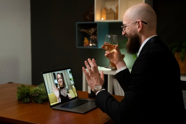 A CRO is conducting a one-on-one virtual meeting with a remote employee, providing support and mentorship. The scene shows empathy, active listening, and a strong focus on employee development.