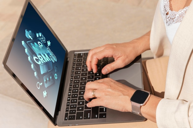 A close-up shot of a person's hands typing on a laptop, with a generative AI interface visible on the screen. The AI interface is generating creative content, such as text or images, showcasing its ability to assist in content creation tasks. The image highlights the intersection of human input and AI assistance in enhancing productivity.